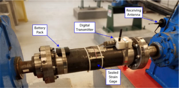 a basic battery powered strain gage based torque telemetry system installed on a motor output spindle
