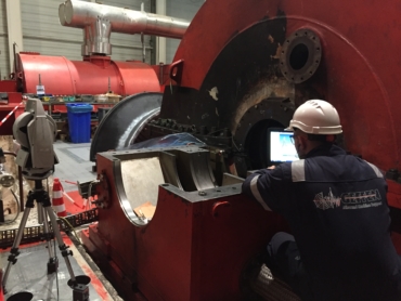 Plant Engineer Conducting Shaft Alignment on Machinery Components